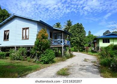 Penan modern settlement house along Melinau river at Mulu National Park - Shutterstock ID 2311820207