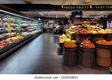 PENANG, MALAYSIA - 14 DEC 2021: Fresh local fruits and organic vegetables for sale in Mercato grocery store. Mercato is the coolest fresh premium supermarket in Malaysia.