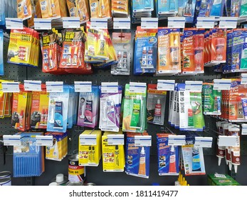 PENANG, MALAYSIA - 18 AUG 2020: Various choice of glue stick, tube and bottle display in HomePro store. HomePro is a hypermarket of home product and building construction in Malaysia.  