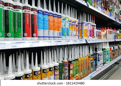 PENANG, MALAYSIA - 18 AUG 2020: Various choice of glue stick, tube and bottle display in HomePro store. HomePro is a hypermarket of home product and building construction in Malaysia.  