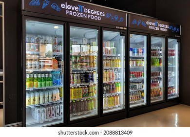 PENANG, MALAYSIA - 2 DEC 2021: Interior view of a huge fridge with various choices cold beverages in a convenience store in Penang.