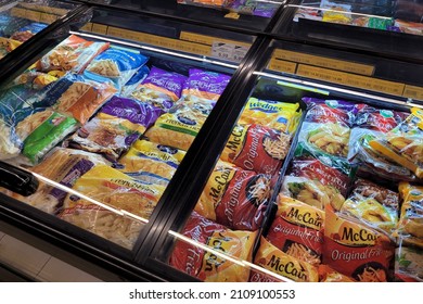 PENANG, MALAYSIA - 2 JAN 2022: Various brands frozen food displayed in refrigerator in Sam's grocery store Penang. Sam's grocery is the coolest fresh premium supermarket in Malaysia.