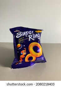 Penang, Malaysia - 20 November 2021 ; Super Ring Is A Junk Food On The Table Isolated