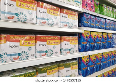 PENANG, MALAYSIA - 23 JULY, 2019: Aisle View Of Various Brand Of Feminine Hygiene Products  On Shelf In Tesco Grocery Store.