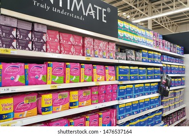 PENANG, MALAYSIA - 23 JULY, 2019: Aisle View Of Various Brand Of Feminine Hygiene Products  On Shelf In Tesco Grocery Store.