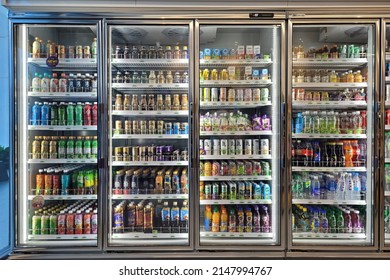 PENANG, MALAYSIA - 26 MAR 2022: Huge fridge with various choice foods and beverages in CU Convenience Store. CU is a South Korean convenience store chain that is operated and owned by BGF Retail.