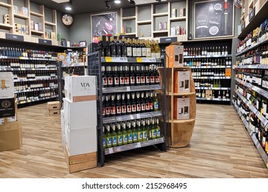 PENANG, MALAYSIA - 28 MAR 2022: Assortment Of Wine And Hard Liquor Bottles Stacked Neatly On Store Shelves In Aeon Grocery Store. Aeon Is The Coolest Fresh Premium Supermarket In Malaysia.