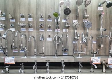 PENANG, MALAYSIA - 3 MAY 2019 : Various brands of faucets, shower head and tap display in HomePro store. HomePro is a hypermarket of home product and building construction in Malaysia.
