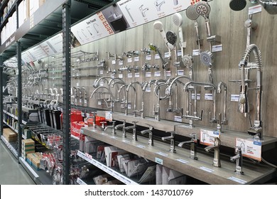 PENANG, MALAYSIA - 3 MAY 2019 : Various brands of faucets, shower head and tap display in HomePro store. HomePro is a hypermarket of home product and building construction in Malaysia.