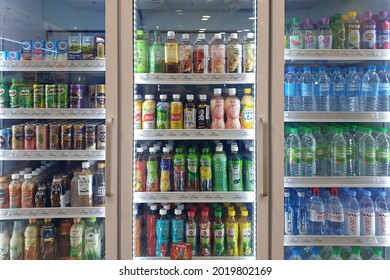 PENANG, MALAYSIA - 4 AUG 2021: View Of Huge Glass Fridge With Various Choice Beverages In FamilyMart, Penang. FamilyMart Is Japanese Convenience Store Franchise Chain In Japan And Operating In Asia. 