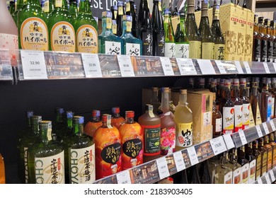 PENANG, MALAYSIA - 4 JULY 2022: Shelf Of Import Japanese Liquor Display On Shelves In AEON Grocery Store. AEON Group Is A Group Of Retail And Financial Services Companies Based In Chiba, Japan. 