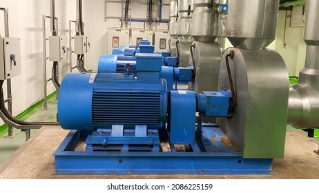 Penang, Malaysia - 6 December,2021: Electric Motor And Large Centrifugal Pump In Building Cooling Systems For Manufacturing Industry, Out Of Focus, Noise And Grain Effects, Selective Focus.