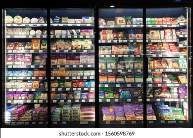 PENANG, MALAYSIA - 7 NOV 2019: Interior view of huge glass refrigerator with various brand beverage and food in Mercato grocery store. Mercato is the coolest fresh premium supermarket in Malaysia.