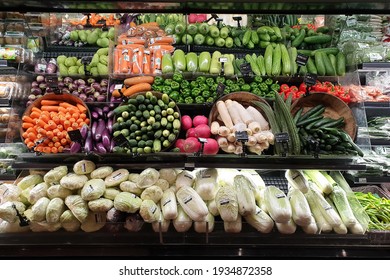 PENANG, MALAYSIA - 8 MAR 2021: Fresh organic fruits and vegetables display on shelves for sale in Mercato grocery store. Mercato is the coolest fresh premium supermarket in Malaysia.