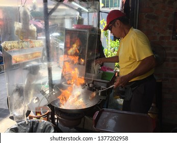 Penang, Malaysia, April 2019.Penang Char Keow Teow Hawker Food Seller