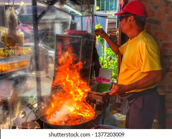 Penang, Malaysia, April 2019.Penang Char Keow Teow Hawker Food Seller