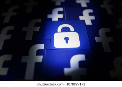 PENANG, MALAYSIA - APRIL 25, 2018: Facebook security and privacy issues. Close up security lock icons with Facebook logo surrounded it.