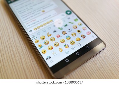 Penang, Malaysia - April 3, 2019: Smartphone With Whatsapp Conversation On The Screen. Chating, Social Network And Messaging Concept