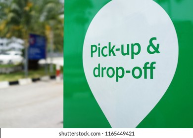 PENANG, MALAYSIA - AUGUST 27, 2018 : Grab Car Pick Up And Drop Off Sign Beside Shopping Mall. Grab Is A Singapore Based Company That Offers Ride-hailing And Logistics Services Through Its App.