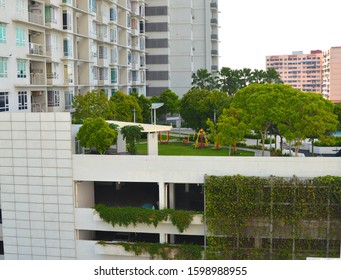 Penang, Malaysia - Dec 2019:  A rooftop garden recreation park on top a high rise apartment condominium. Garden on roof top of high rise building. 