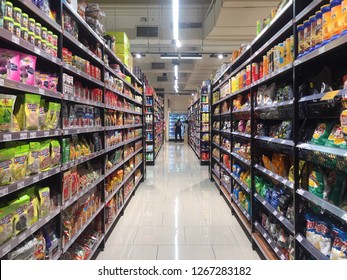 Penang, Malaysia - December 26, 2018 : Assorted Junk Food Packets Arranged In Shelves For Sale At Jaya Grocery Gurney Paragon