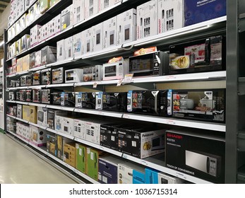 PENANG, MALAYSIA - FEB 2, 2018 : Various brands of oven and microwave on store shelf at HomePro. HomePro is a hypermarket of home product and building construction in Malaysia.