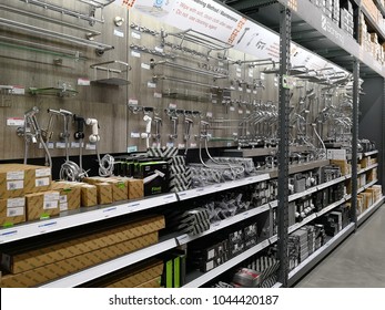 PENANG, MALAYSIA - FEB 5, 2018 : Various brands of faucets, shower head and tap display in HomePro store. HomePro is a hypermarket of home product and building construction in Malaysia.
