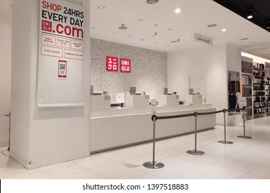 PENANG, MALAYSIA - MAR 7, 2019: Interior View Of Cashier Counter Of Uniqlo Fashion Store In Shopping Mall. Uniqlo Co., Ltd. Is A Japanese Casual Wear Designer, Manufacturer And Retailer.