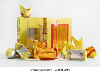PENANG, MALAYSIA - MAR 9, 2018 : Joss Paper are sheets of paper and made into burnt offerings common in Chinese ancestral worship such the veneration of the deceased family members and relatives