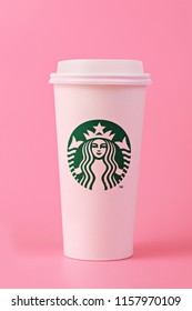 PENANG, MALAYSIA - MAY 1, 2018: White Coffee Cup With Starbucks Logo On Pink Background. Starbucks Is The World's Largest Coffee House With Over 20,000 Stores In 61 Countries.