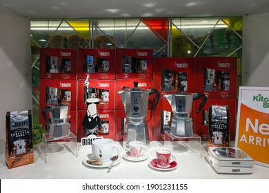 PENANG, MALAYSIA - NOV 30, 2020: Various size of Bialetti Moka pot coffee maker on the shelf in kitchen store. 