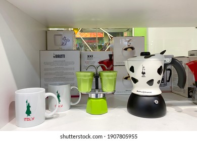 PENANG, MALAYSIA - NOV 30, 2020: Various size of Bialetti Moka pot coffee maker on the shelf in kitchen store. 