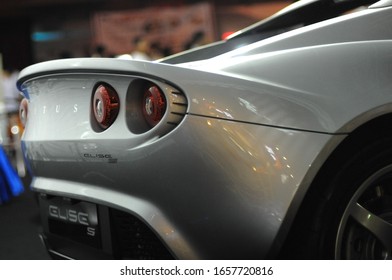 Penang, Malaysia. October 23, 2010. Side rear view of the silver gray Lotus Elise, spotting round lights on display at the motor show.