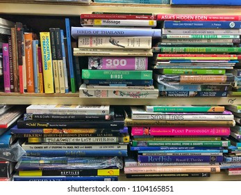 Penang,Malaysia-June 1st,2018:Close Up Shot Of Books Stacked Into A Rack Of A Second Hand Book Store. Most Of These Store Is Situated At The 2nd Floor Of Chowrasta Complex In Penang