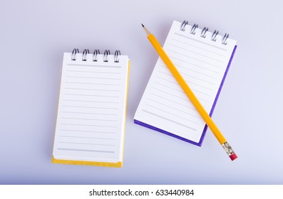Pencil above Spring note