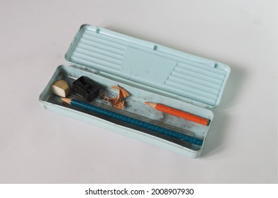 Pencil Box Of A School Kid In A White Background                              