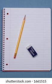 Pencil And Eraser With College Rule Paper