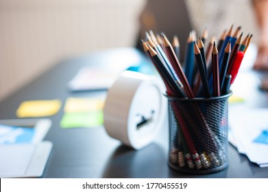 Pencil Holder Placed On An Office Desk.