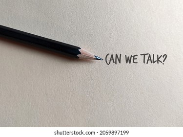 Pencil on copy space craft paper with text written CAN WE TALK?, concept of asking to have an openly communication which is important in relationships or better understandings when working in team