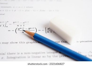 Pencil on mathematic formula exercise test paper in education school.