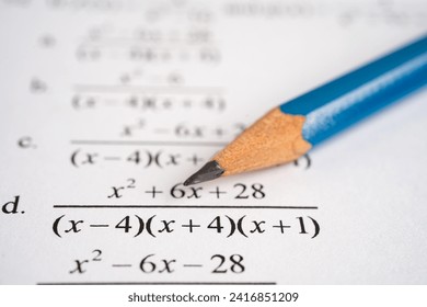 Pencil on mathematic formula exercise test paper in education school.