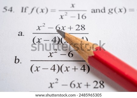 Pencil on mathematic formula exercise test paper in education school.