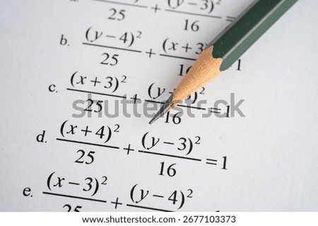 Pencil on mathematic formula exercise test paper in education school.