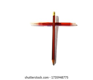 A Pencil On The Pen Like The Symbol Of The Cross On A White Background
