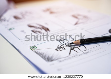 Pencil on Storyboard movie video layout for pre-production, storytelling drawing creative for process production media films. Script editors and writing graphic in form displayed in maker shooting ストックフォト © 