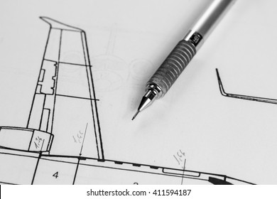 Pencil  on technical drawing of an airplane