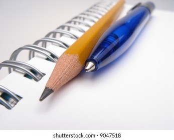 Pencil, pen and notepad, close up