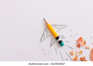 Pencil and rocket sketch over textured paper, concept of back to school, creativity and success