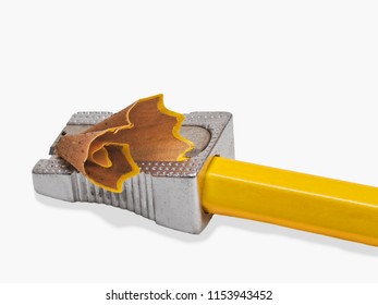a pencil is shapened with an sharpener 