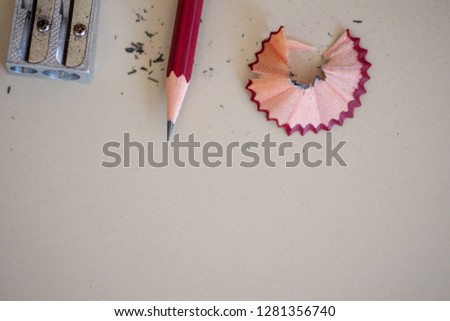 Pencil with sharpner against clear background